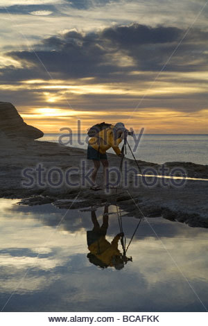 Photographer reflection at sunrise, Baja California, Mexico. Stock Photo