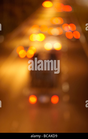 Blurred night freeway traffic Stock Photo