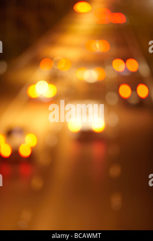 Blurred night freeway traffic Stock Photo