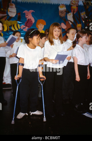 Multi Ethnic group Of Children Singing In Choir At Christmas Stock Photo