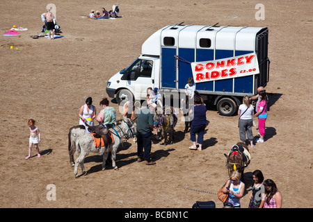 Donkey rides on the beach by the Victorian pier at Saltburn-By-The-Sea ...