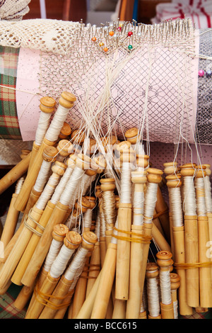 Lace making Bobbins thread and pillow Stock Photo