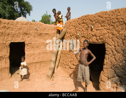 Burkina Faso. Lobi country. Animist family in the Sukala(traditional house). Stock Photo