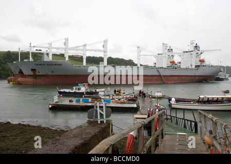 Container ship on the River Fal, at Smugglers Cottage Stock Photo