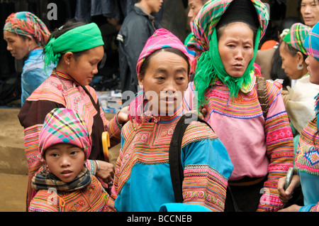 A group of Flower Hmong tribal women at the market place of Mouang Khoung Northern Vietnam Stock Photo