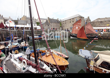 Portsoy Harbour in Aberdeenshire, Scotland, UK, busy with vessels for the annual Scottish Traditional Boat Festival weekend Stock Photo