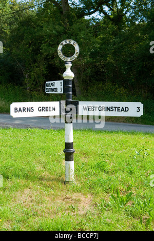 Signpost at Dragon's Green village. West Sussex, UK Stock Photo