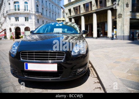 Modern taxi in a city Wide angle view Stock Photo