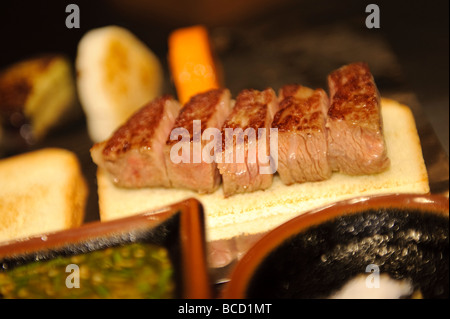 Cooked Coby Meat Kobe meat, wagyu beef steak, cooked, with soy sprouts Stock Photo - Alamy