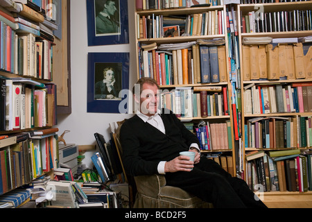 Poet Andrew Motion sat in the study where he works at his North London Home Stock Photo