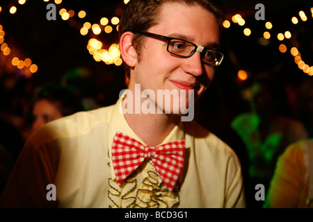 A man wears a bow-tie at the 2009 Rock N Roll Prom at the Blue Bird in Bloomington Indiana Stock Photo