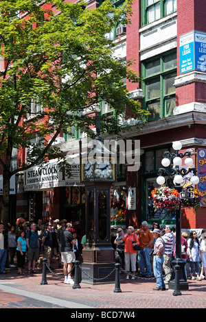 Tourists at Steam clock in Gastown Vancouver City Canada North America Stock Photo