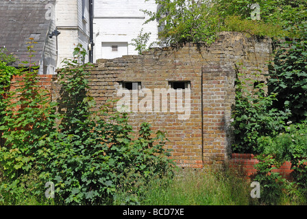 WWII Pillbox at Kiln Bridge Kiln Bridge St John s Woking which was rebuilt in 1899 and restored in 1991 was named after the bric Stock Photo