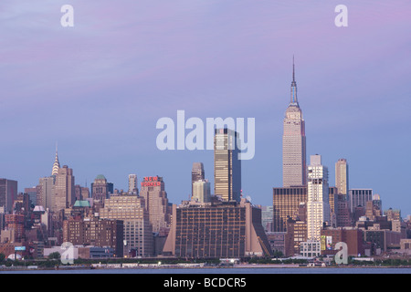 The Empire State Building and mid-town Manhattan skyline as seen from New Jersey. Stock Photo