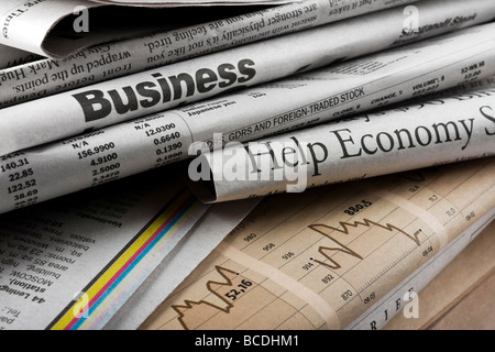 The big stack of old business newspapers Stock Photo