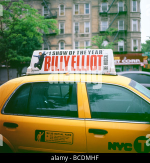 Advertisement for Billy Elliot the Musical on a New York City yellow taxi cab USA KATHY DEWITT Stock Photo