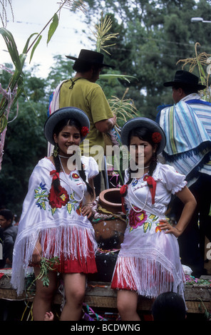 Girls in traditional dress on float at carnival , Tarija , Bolivia Stock Photo