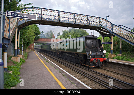 Bulleid Light Pacific 34067 'Tangmere' at speed through Sole Street Station, Kent, UK.