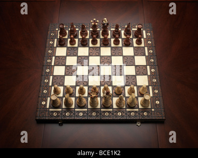 Chessboard on a table Stock Photo