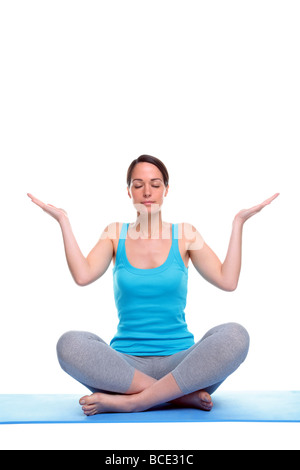 Woman doing yoga isolated in a white background Stock Photo - Alamy