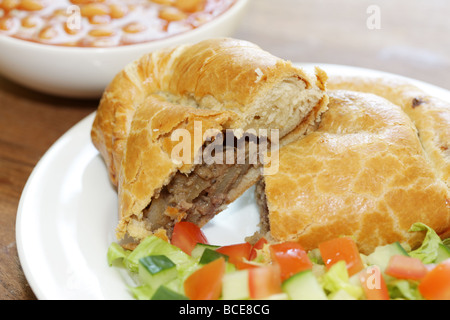 Steak and Stilton Pasty with Baked Beans and Salad Stock Photo