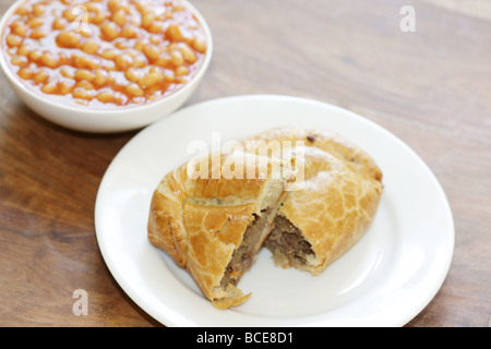 Steak and Stilton Pasty with Baked Beans Stock Photo