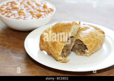 Steak and Stilton Pasty with Baked Beans Stock Photo