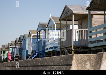 Beach huts along the coast at Tankerton Bay near Whitstable, Kent UK Stock Photo