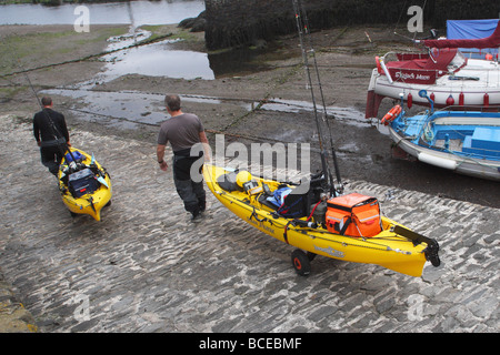 Ocean kayak fishing boats selection hi-res stock photography and