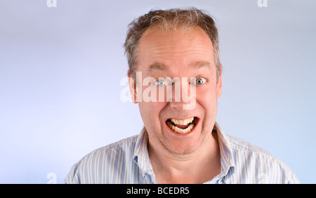 A man is smiling to the camera Stock Photo