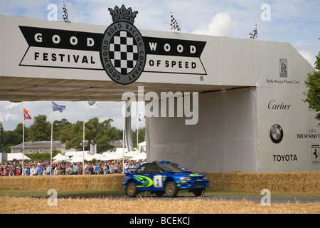 Car on the hillclimb track at the Goodwood Festival of Speed 2009 motion blur Stock Photo