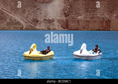 Swan-shaped pedalos, an unexpected sight on Afghanistan's Band-e Amir lakes, reflect local people's hopes for rising tourism Stock Photo