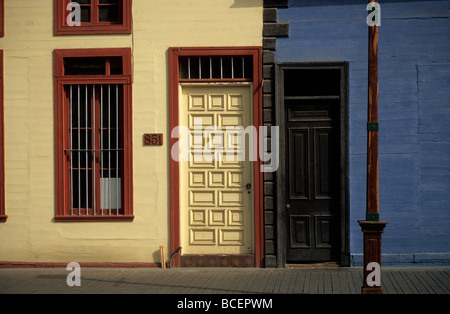 Detail of historic wooden houses and doorways in Baquedano Street, Iquique, Chile Stock Photo