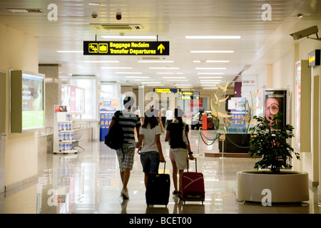 Arriving passengers make their way to baggage reclaim, Malta airport Stock Photo