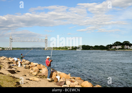 Fisherman fishing at the Cape Cod Canal, Sandwich, MA Stock Photo