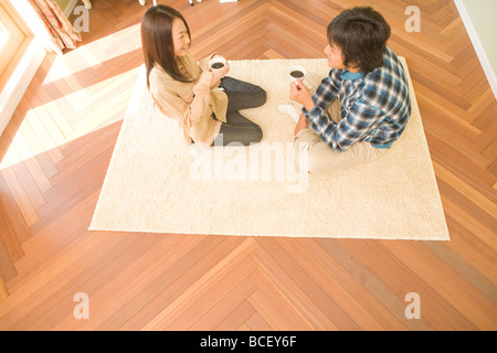 Young couple drinking coffee Stock Photo
