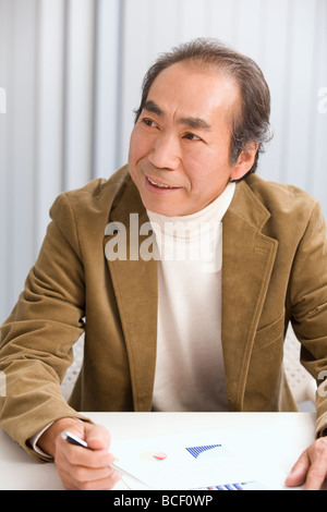 Portrait of Mature Man in office Stock Photo