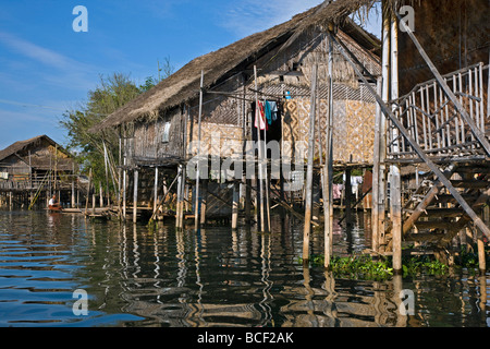 Myanmar, Burma, Lake Inle. Typical Intha houses on stilts in Lake Inle. The patterned walls are made of woven bamboo. Stock Photo