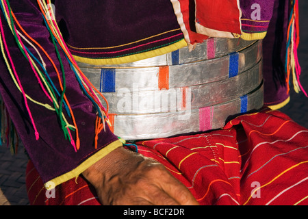 Myanmar. Burma. Wanpauk village. A Palaung woman of the Tibetan-Myanmar group displays her wealth, wearing broad silver belts. Stock Photo