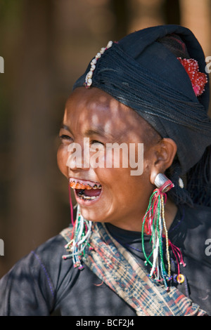 Myanmar, Burma, Pan-lo. A woman of the small Ann tribe in traditional attire with blackened teeth. To ward off evil spirits. Stock Photo