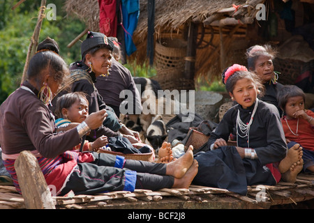 Myanmar, Burma, Pan-lo. A family of Ann on the bamboo platform of their house. Stock Photo