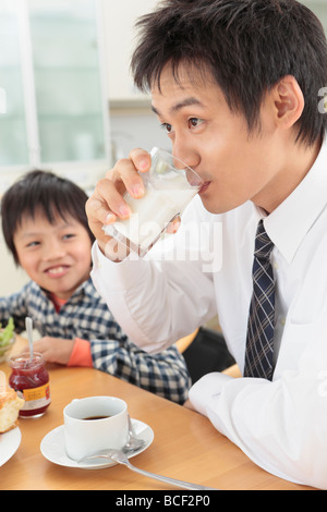 Father and son having breakfast Stock Photo