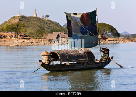 Myanmar, Burma, Kaladan River. A traditional sailing boat on the Kaladan River. Stock Photo