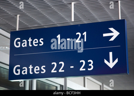 Departure gate sign, Terminal 5, Heathrow airport, London, England Stock Photo