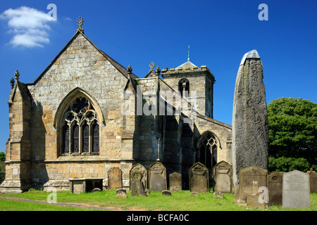 Rudston monolith and All Saints Church Rudston East Riding of Yorkshire Stock Photo