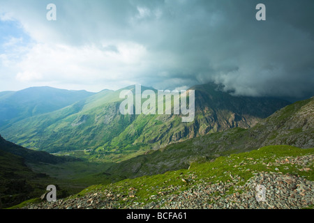 Storm clouds rolling in over Glyder Fawr taken from the Llanberis path close to Clogwyn Station on the slopes of Snowdon, Snowdo Stock Photo
