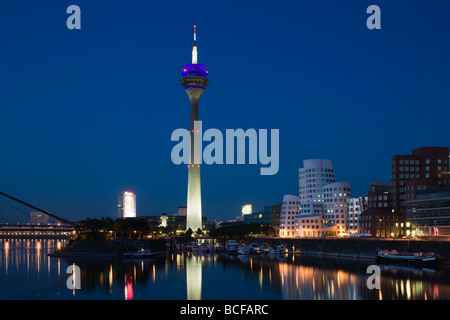 Germany, Rhineland-Westphalia, Dusseldorf, Medienhafen and Rhein Tower Stock Photo