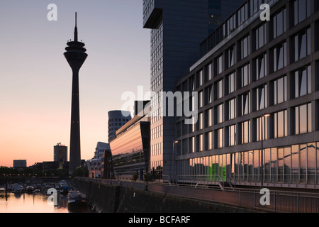 Germany, Rhineland-Westphalia, Dusseldorf, Medienhafen and Rhein Tower Stock Photo