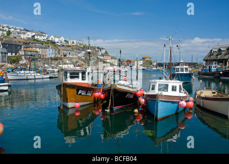 Boats in the harbour at Mevaggisey Cornwall Stock Photo