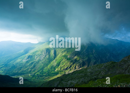 Storm clouds rolling in over Glyder Fawr taken from the Llanberis path close to Clogwyn Station on the slopes of Snowdon, Snowdo Stock Photo